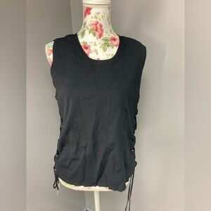 Rebel Wilson lace up sleeveless sweater